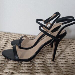 Black strappy high heels